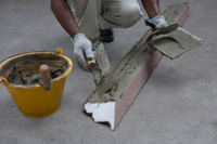 apply cement adhesive